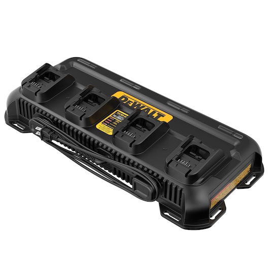 A black DEWALT battery charger with four charging slots, coiled power cord, and yellow DEWALT branding on top, designed for charging multiple power tool batteries.