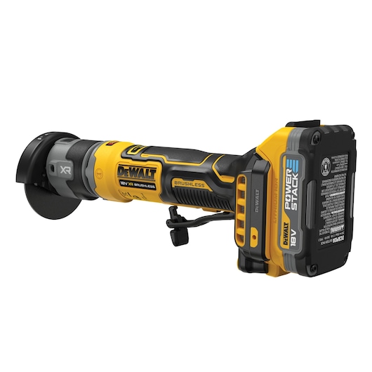 A DEWALT 18V XR brushless cordless angle grinder, featuring a POWERSTACK battery. The tool is yellow and black with ergonomic design and labeling visible on the side.