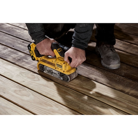 18V XR Brushless Belt Sander sanding floor board