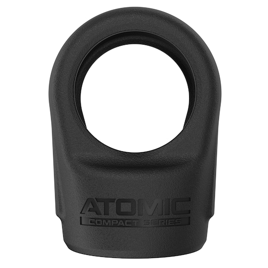 A black DEWALT ATOMIC Compact Series camera lens cover with a circular opening at the top.